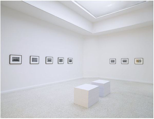 Center: "Untitled" (Memorial Day Weekend), 1989; "Untitled" (Veterans Day Sale), 1989. Left and right walls: "Untitled" (Natural History), 1990. Reflected: "Untitled" (America), 1994.
