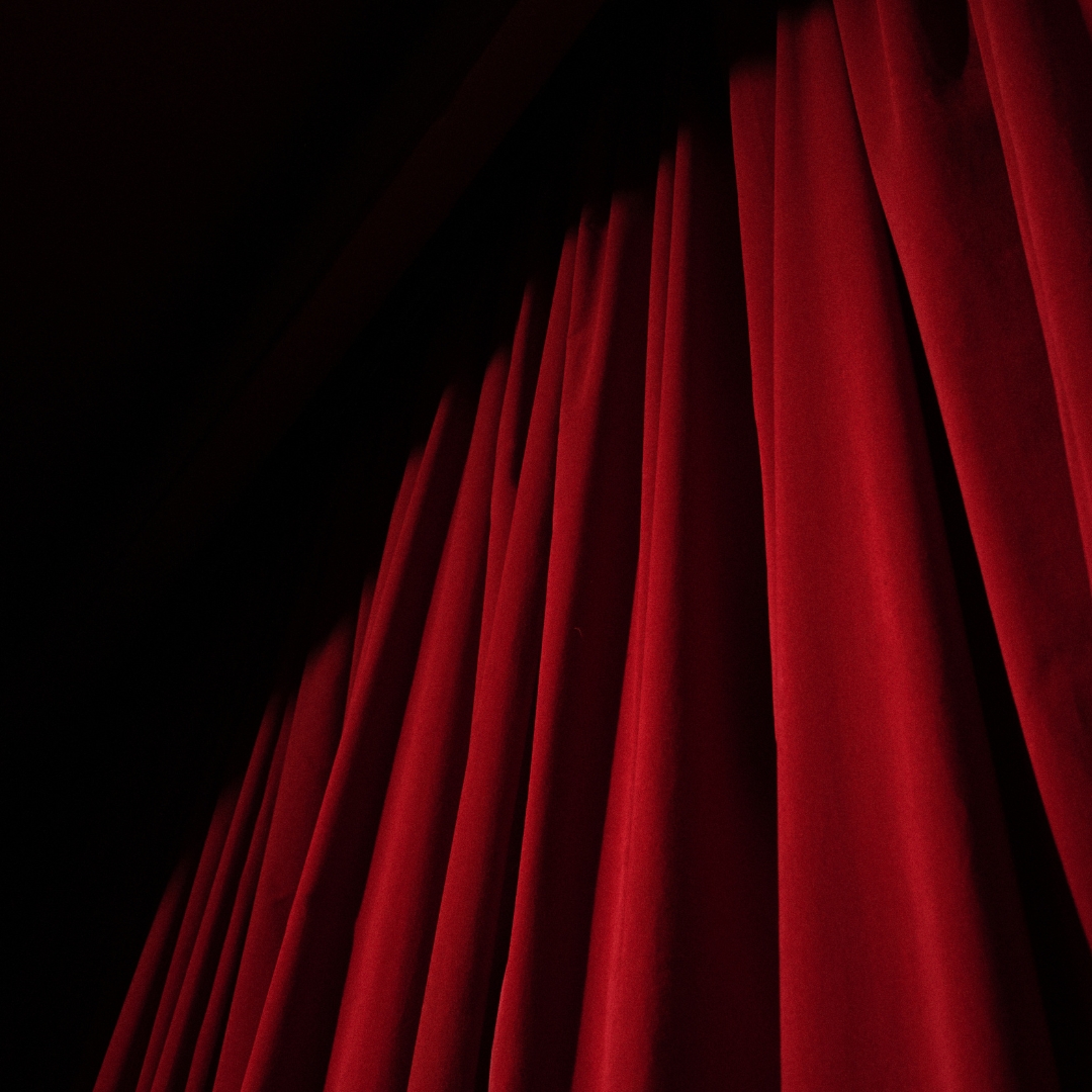 Red curtains in a theater.