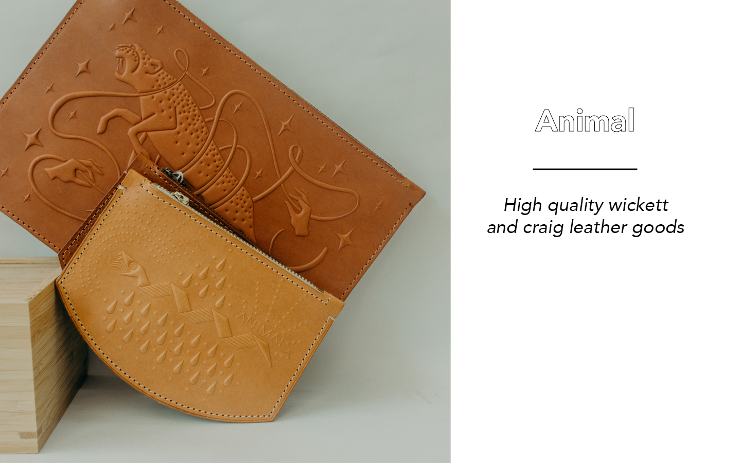 Tan leather hand bags with a depiction of a leopard mid stride