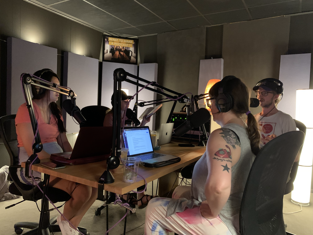 City Cast Denver team recording the podcast in studio