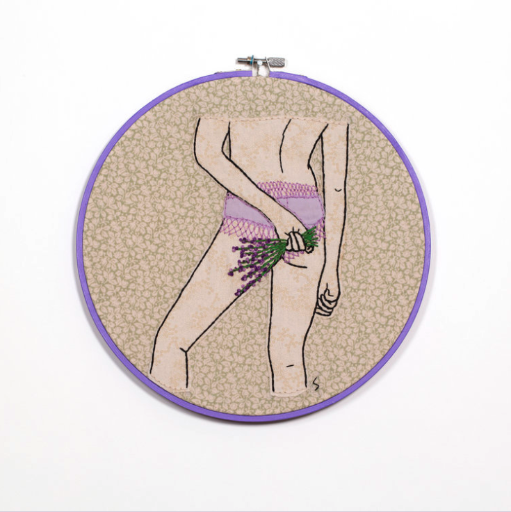 embroidery of a woman's backside in purple panties holding a bouqet of lavender