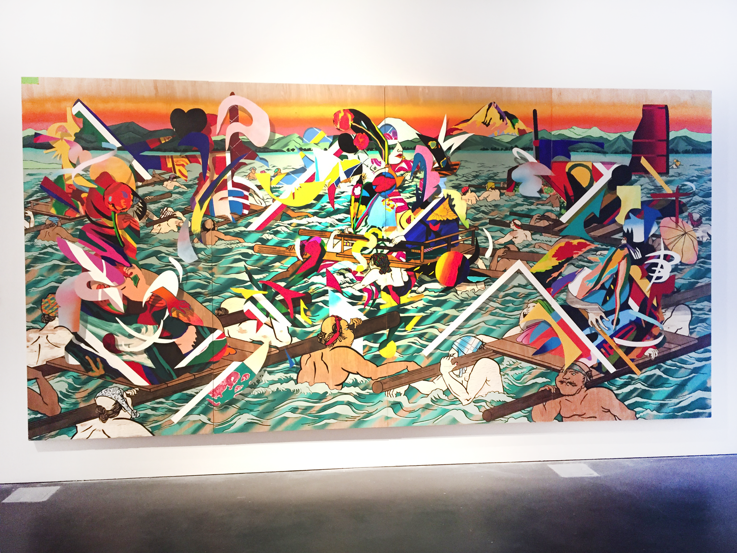 Installation of a large painting depicting a sunset glowing over mountains in the background. In the foreground, a ship wreck has occurred and abstracted humans struggles to stay above water.