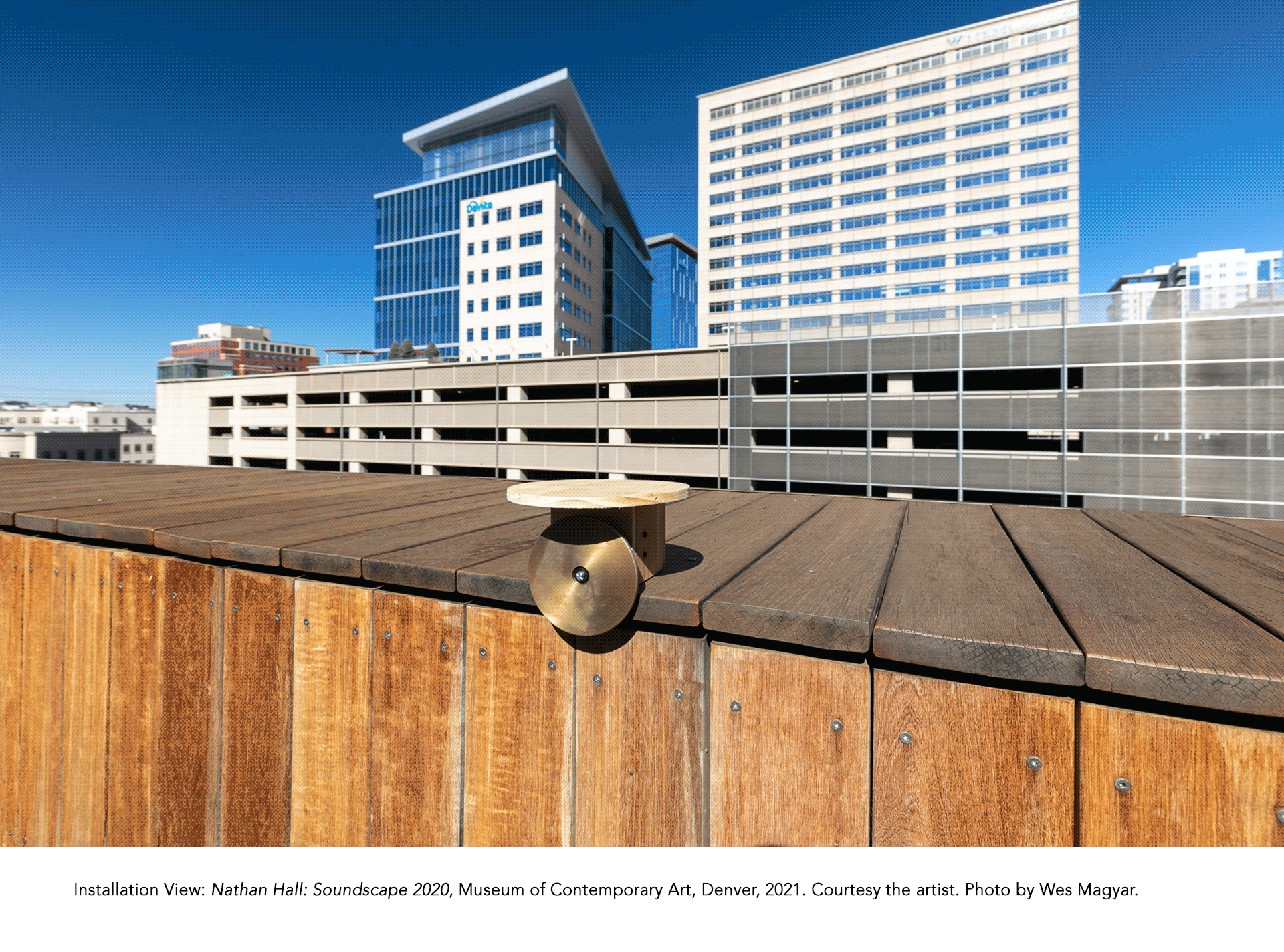 GIF of photographs of small brass speakers installed on the rooftop garden of MCA Denver.