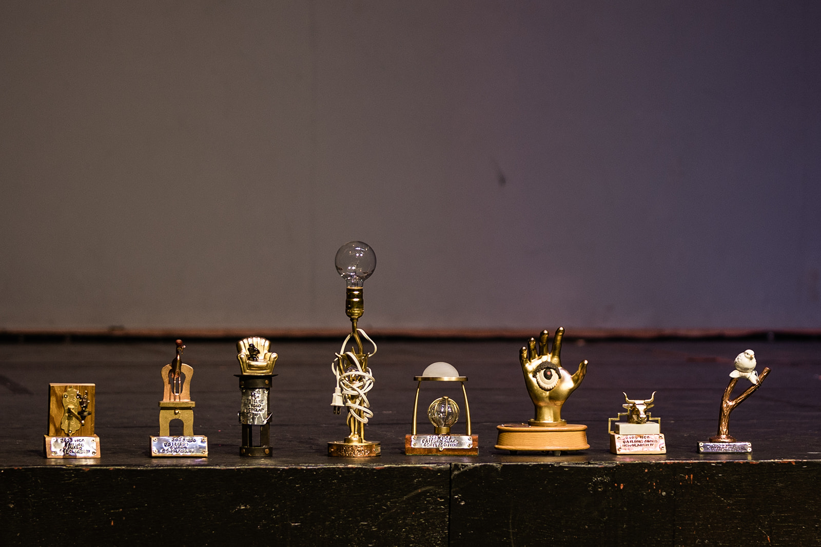 Funky trophies on a stage.