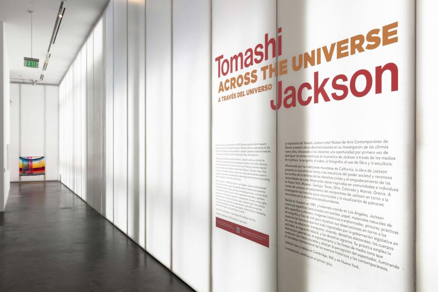 MCA Denver gallery with white walls and wall text that reads, "Tomashi Jackson: Across the Universe"