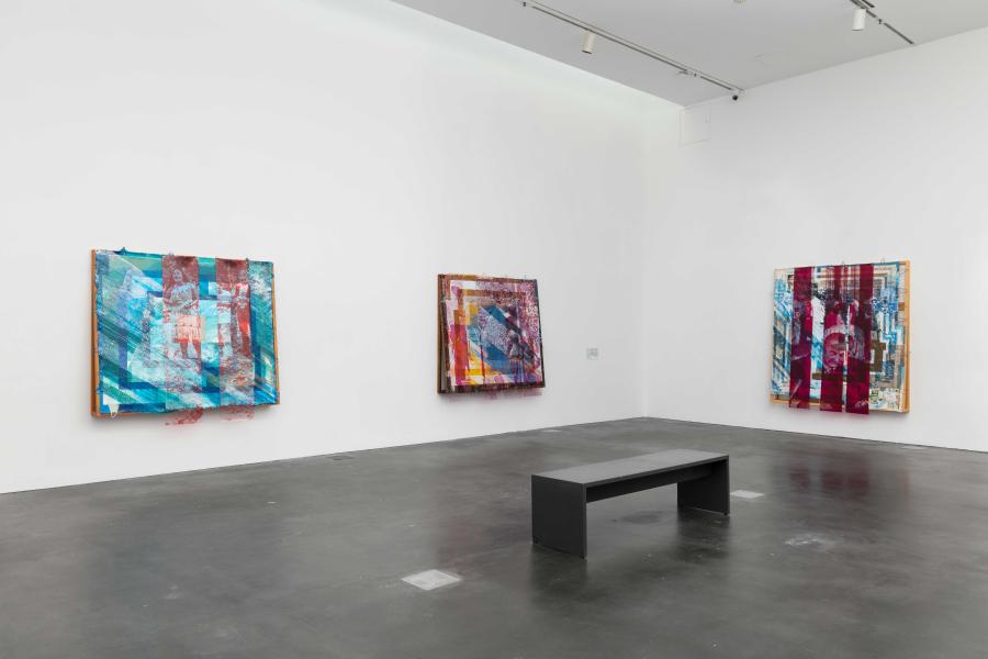 MCA Denver gallery with three large abstract works hung on white walls. 