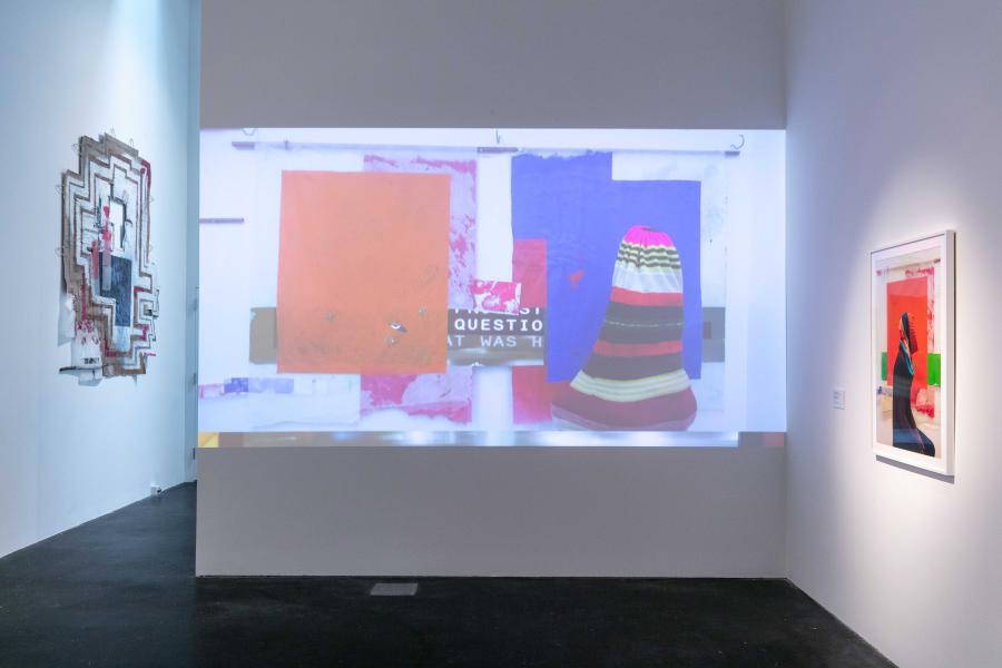 A video projected onto a wall in an MCA Denver gallery.