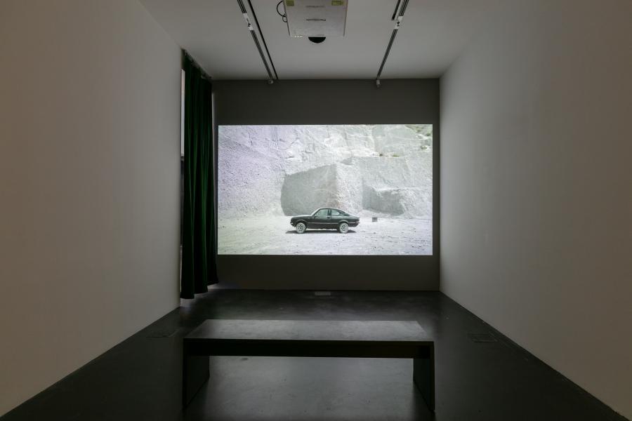 Video installation in a dark gallery.