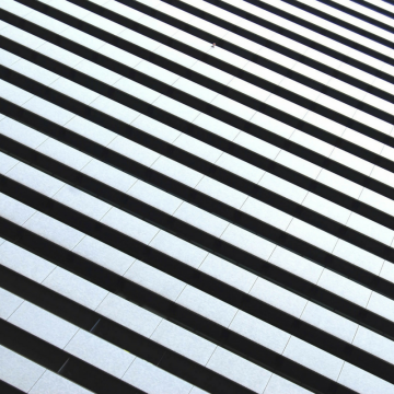 Diagonal black and white stripes.