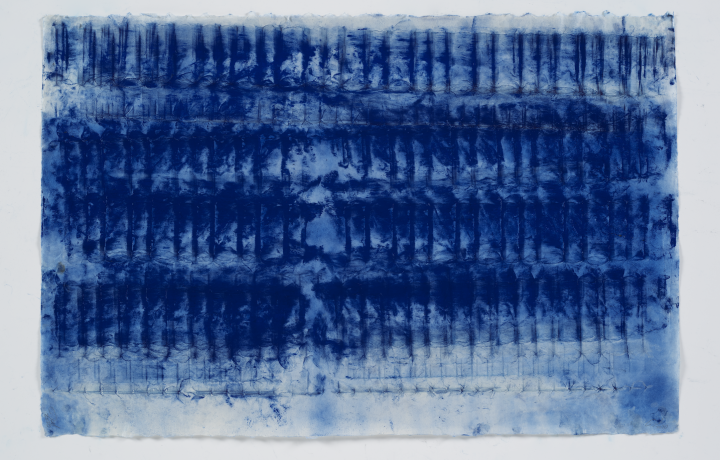 Work on paper featuring rich blue pigment. The shapes in the works resemble that of piano keys.