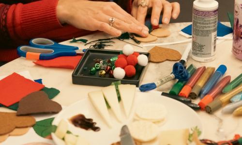 Close up of people crafting ornaments