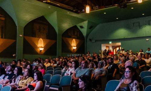 People sitting in a theater.